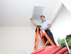 Man Improving Airflow And Cooling Efficiency